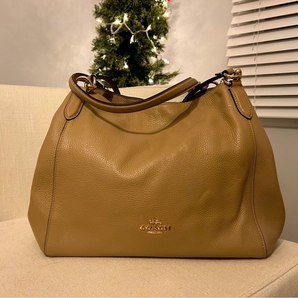 New, never used authentic Coach purse in beige